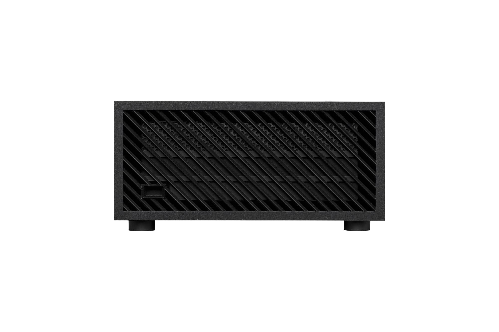 Czarny, prostokątny głośnik lub urządzenie techniczne z ukośnymi otworami wentylacyjnymi, stojący na dwóch małych podstawkach.