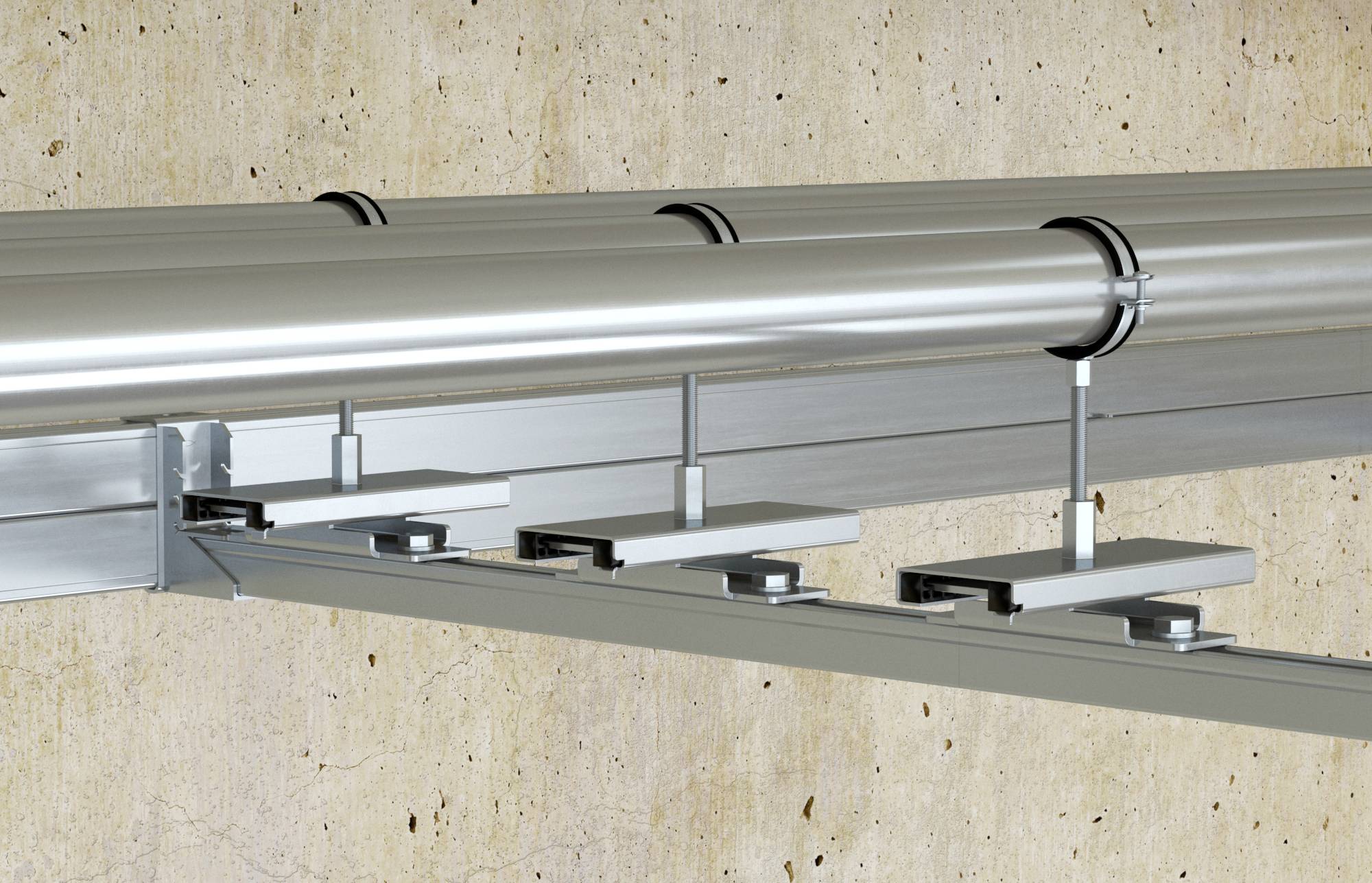 Metalowa konstrukcja szynowa z przymocowanymi rurami do ściany betonowej, podtrzymywana przez uchwyty i zaciski w celu stabilizacji.