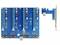 Niebieska płytka drukowana z czterema slotami PCIe i elementami elektronicznymi. Obok mniejsza karta rozszerzeń.