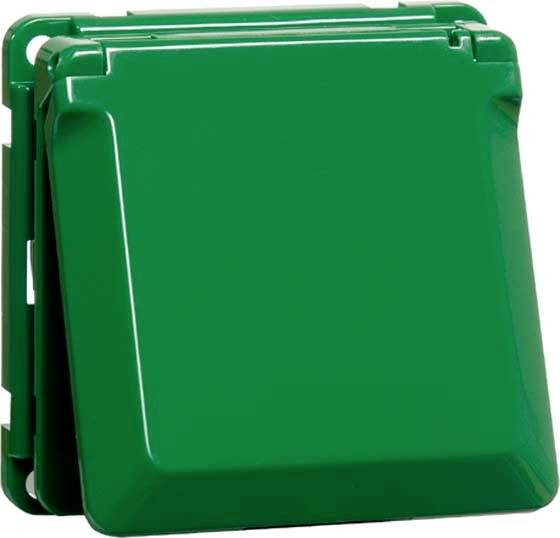 Zielona, kwadratowa pokrywa elementu elektrycznego.