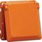Pomarańczowy, kwadratowy zamknięć z zaokrąglonymi rogami, prawdopodobnie przeznaczony do zastosowań technicznych lub przemysłowych.