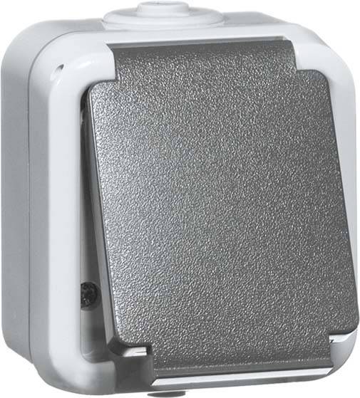 Szary, odporny na warunki atmosferyczne przełącznik w kwadratowej obudowie z zaokrąglonymi narożnikami, odpowiedni do stosowania na wolnym powietrzu.