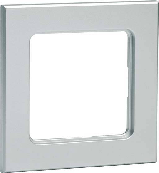 Kwadratowa, srebrna metalowa ramka z zaokrąglonymi rogami. Odpowiednia do włącznika światła lub gniazdka elektrycznego.