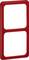 Czerwona, prostokątna ramka z dwoma wycięciami, ułożonymi pionowo. Odpowiednia do podwójnej osłony włączników lub gniazd elektrycznych.
