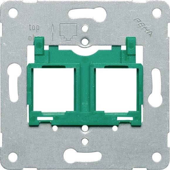 Metalowa rama do puszki podtynkowej z zielonym wkładem do podłączeń. Na górze wytłoczone jest 'top' i 'ob'.