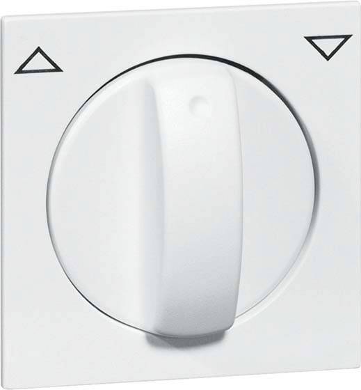 Biały przełącznik obrotowy na ścianie z naniesionymi symbolami strzałek wskazuje kierunek obrotu.