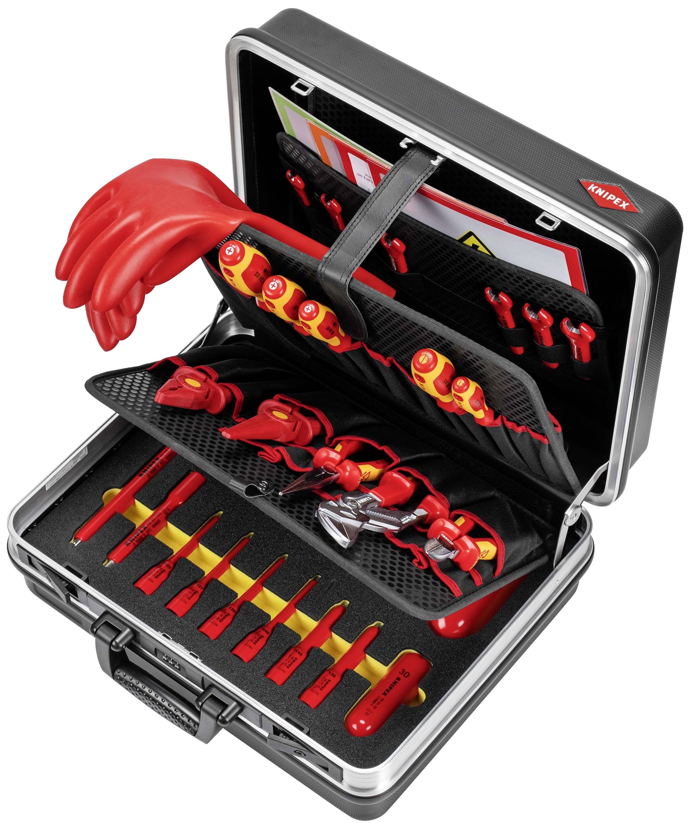 Zestaw narzędziowy z izolowanymi narzędziami elektrycznymi, w tym śrubokręty, rękawice i szczypce, przeznaczony do bezpiecznej pracy przy instalacjach elektrycznych.