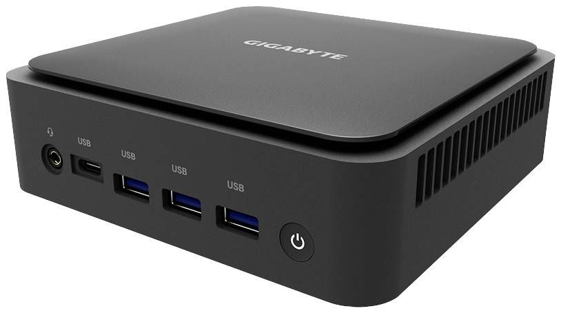 Czarny mini-komputer Gigabyte z wieloma portami USB, gniazdem audio 3,5 mm oraz włącznikiem zasilania z przodu obudowy.