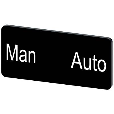 Prostokątna tablica z białymi słowami 'Man' po lewej i 'Auto' po prawej stronie na czarnym tle.