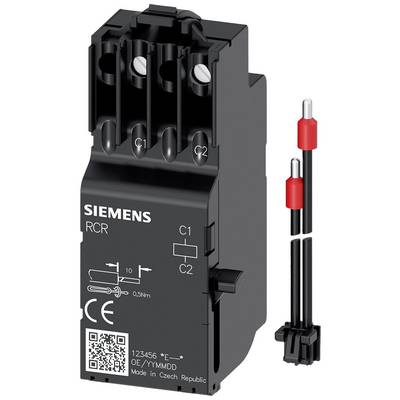 Czarny elektryczny nośnik elementów z dwoma metalowymi trzpieniami, oznaczony napisem 'Siemens RCR', posiada oznaczenia wejść C1 i C2.