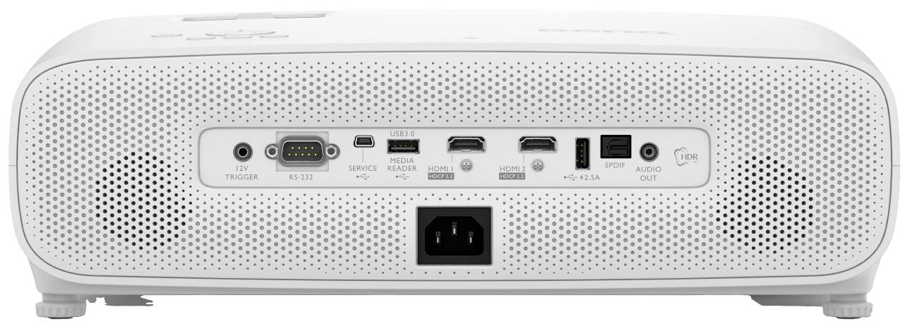 Tylna strona białego projektora z różnymi złączami, w tym HDMI, USB i wyjściem audio, osadzonymi w kratce wentylacyjnej.