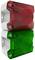Dwa urządzenia alarmowe w kolorach czerwonym i zielonym, ułożone jedno nad drugim, zamocowane na ścianie; prawdopodobnie służące do sygnalizacji statusu.