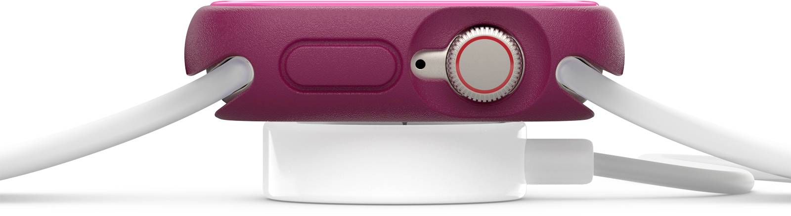 Smartwatch w różowej obudowie, widziana z boku. Dwa przewody są podłączone, jeden prowadzi do stacji ładującej umieszczonej poniżej.