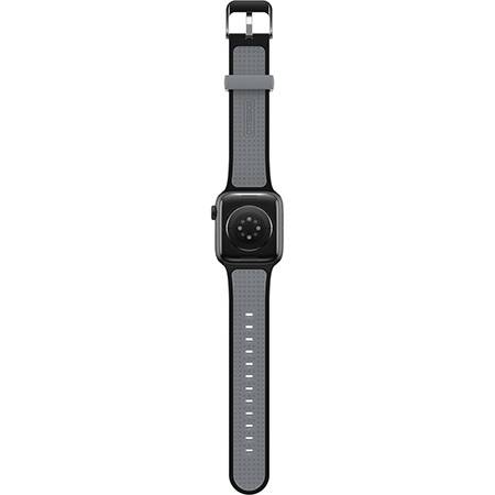 Smartwatch z czarną obudową i szarym paskiem, sfotografowana z przodu z widocznym przyciskiem ekranu.