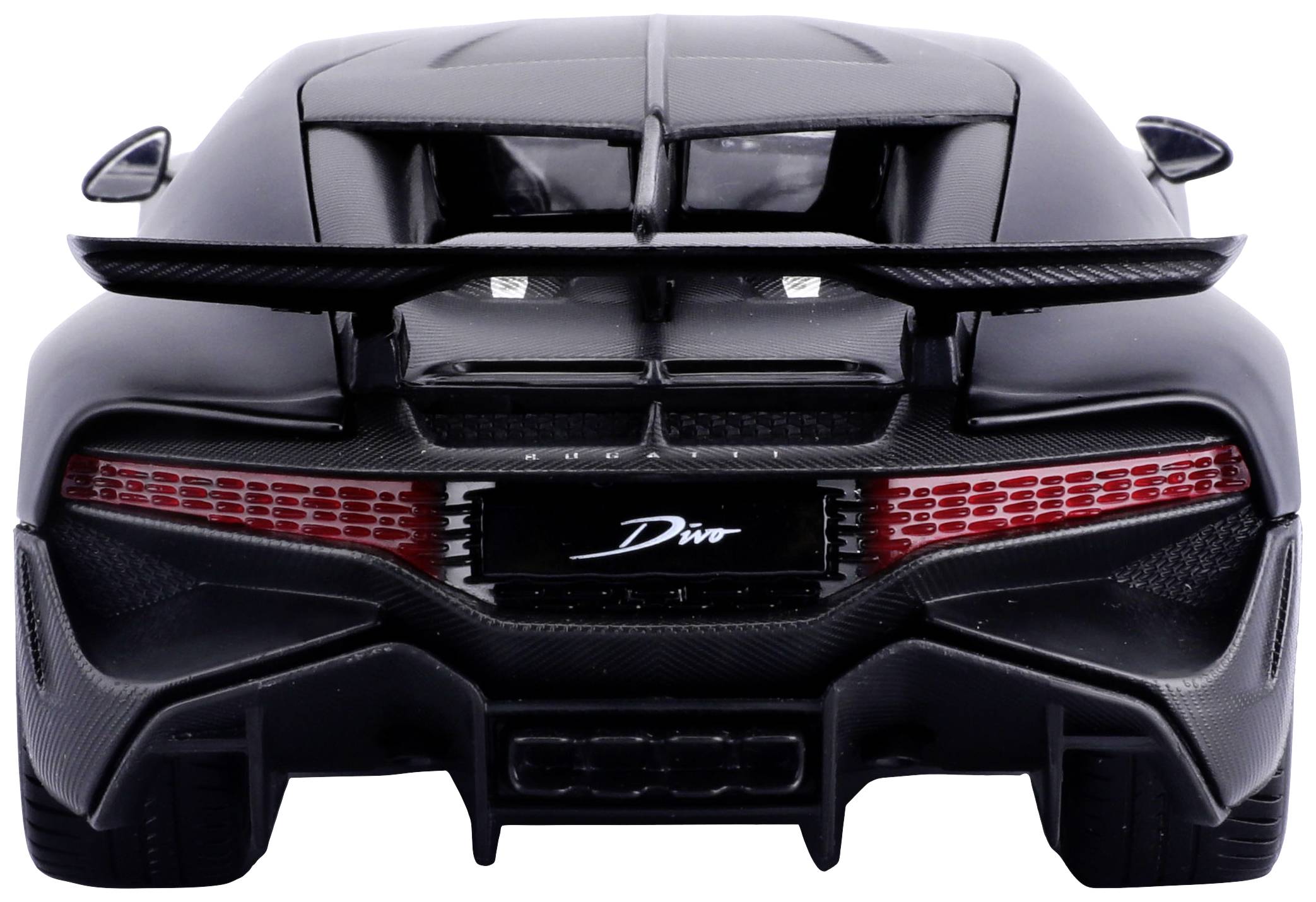 Czarny model samochodu sportowego widziany od tyłu, z charakterystycznym tylnym spoilerem i nowoczesnymi lampami tylnymi.