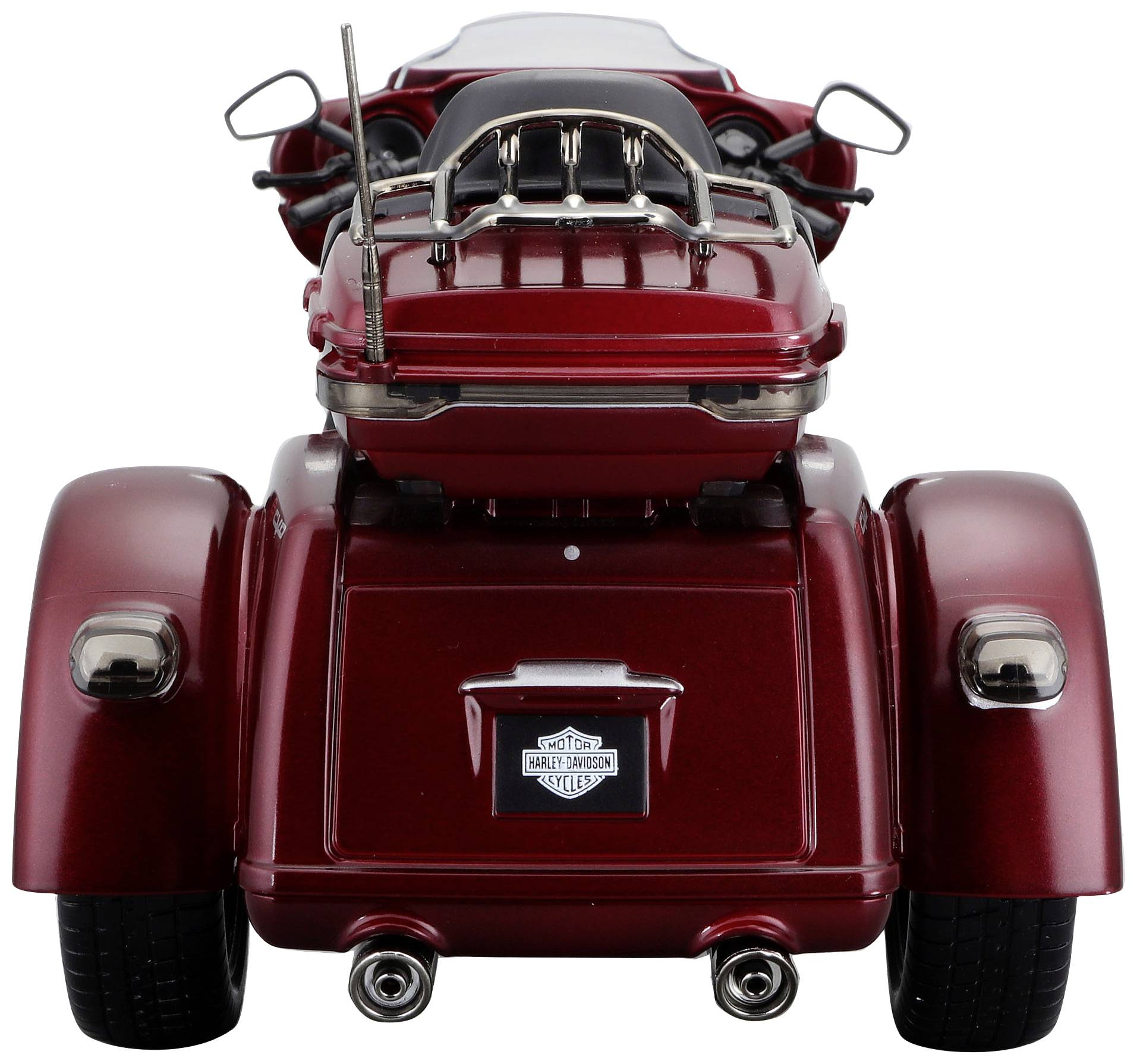 Czerwony trójkołowy motocykl widziany od tyłu z siodłem, kierownicą i dwiema tylnymi lampami, z symbolem 'Harley Davidson' na bagażniku.