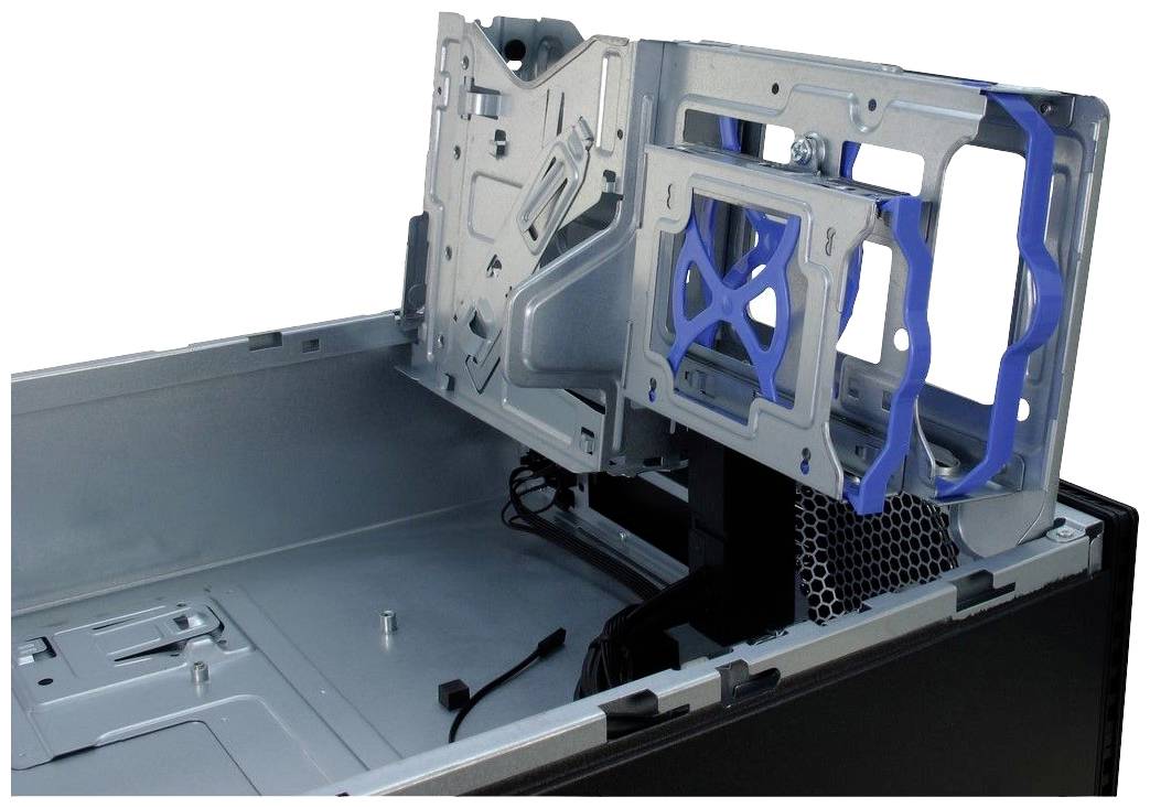 Otwarta obudowa komputera ukazuje pusty wnętrz z mocowaniami na dyski twarde i możliwościami prowadzenia kabli.