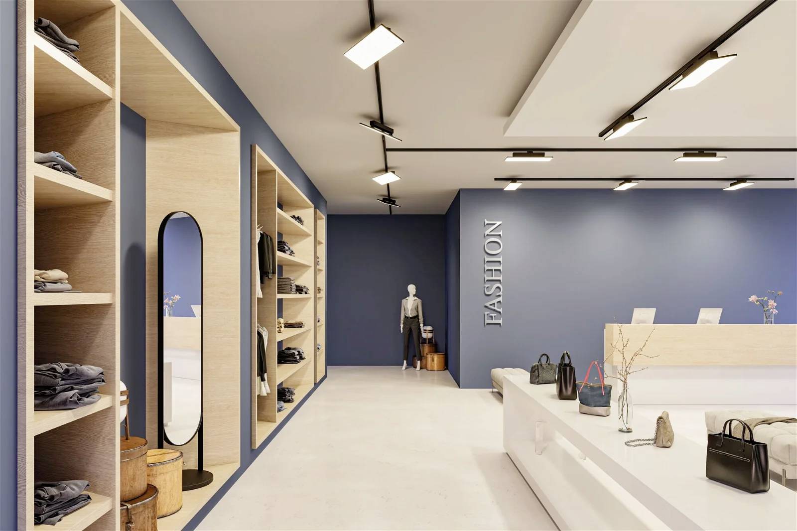 Elegancki butik odzieżowy z niebieskimi ścianami, elementami drewnianymi i nowoczesnym oświetleniem. W tle stoi manekin wystawowy.