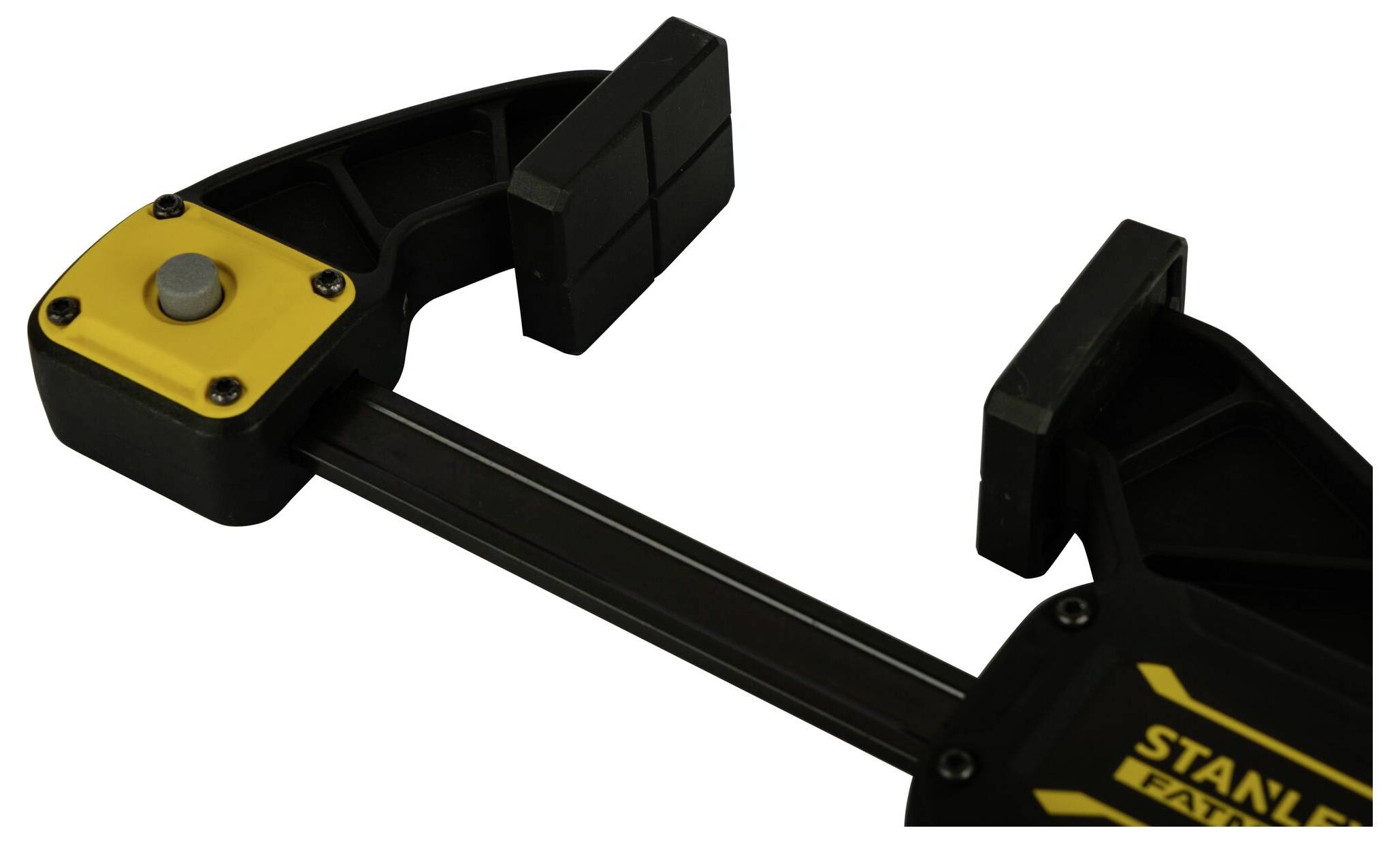 Czarna i żółta ściska z białym tłem, przydatna do mocowania materiałów w projektach rzemieślniczych lub budowlanych.