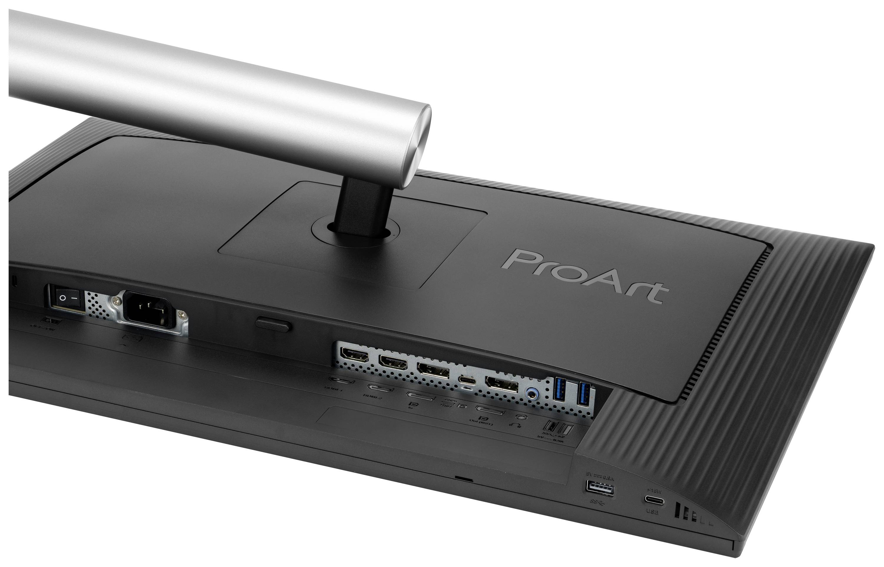 Widok z tyłu monitora z napisem 'ProArt'. Widoczne złącza i metalowy stojak.