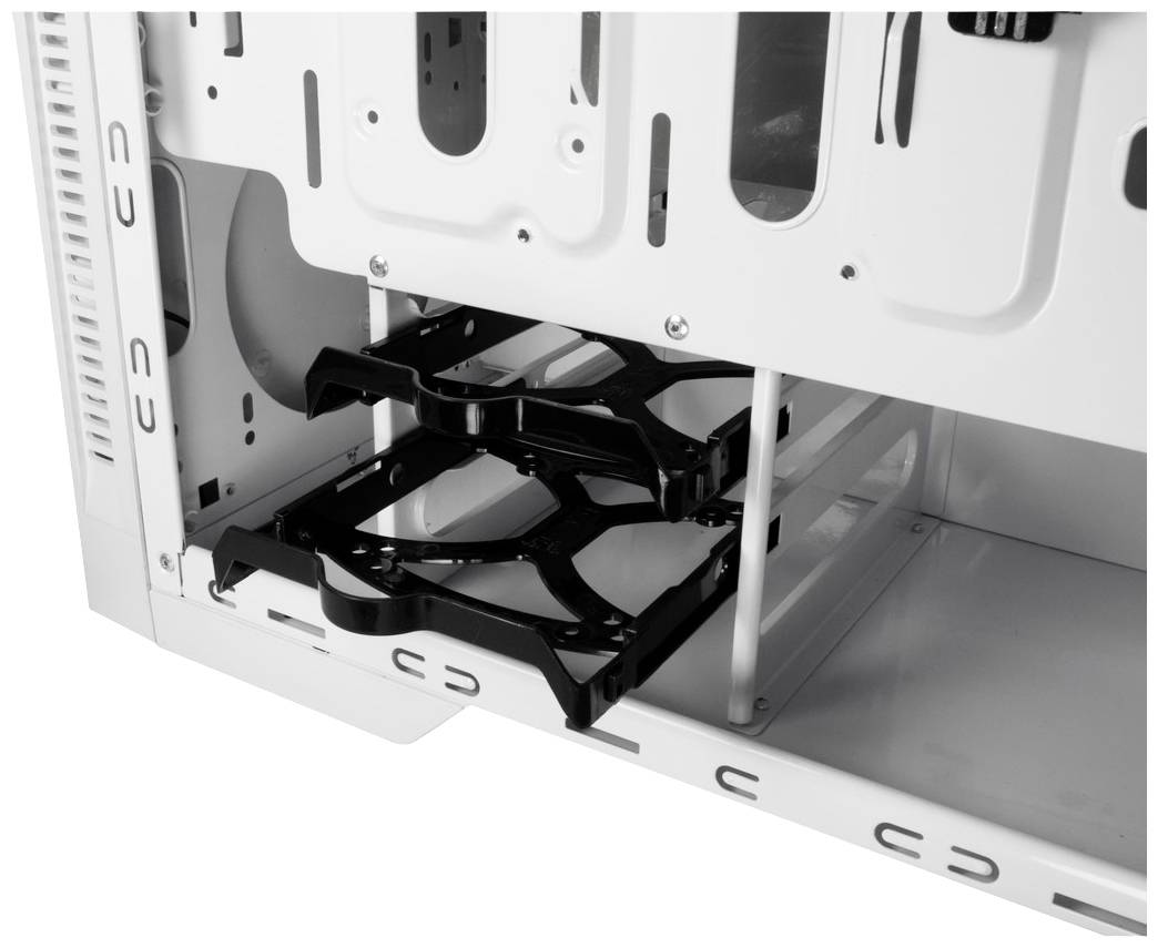 Obudowa komputera z dwoma pustymi mocowaniami na dyski twarde i białym wnętrzem.