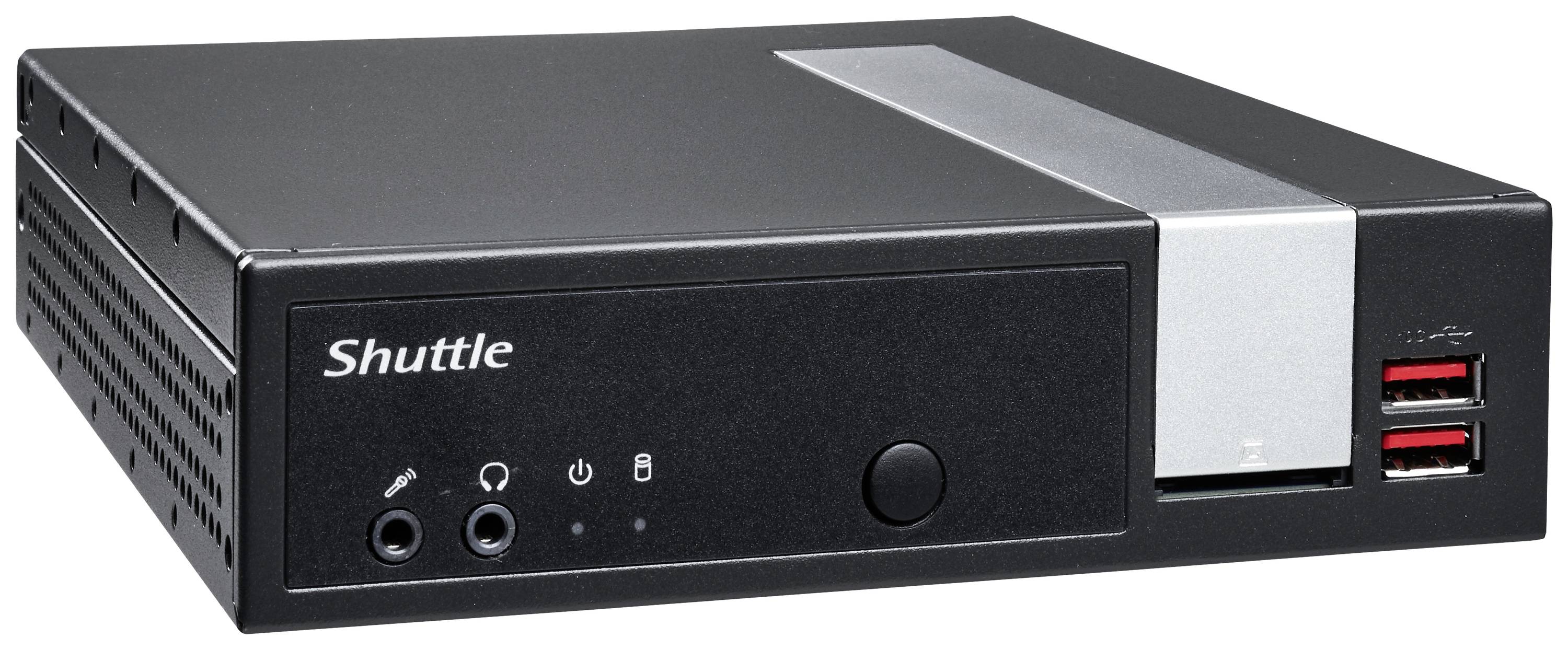 Czarny mini-komputer z portami z przodu, w tym portami USB i wejściami audio. Po lewej stronie widnieje napis 'Shuttle'.