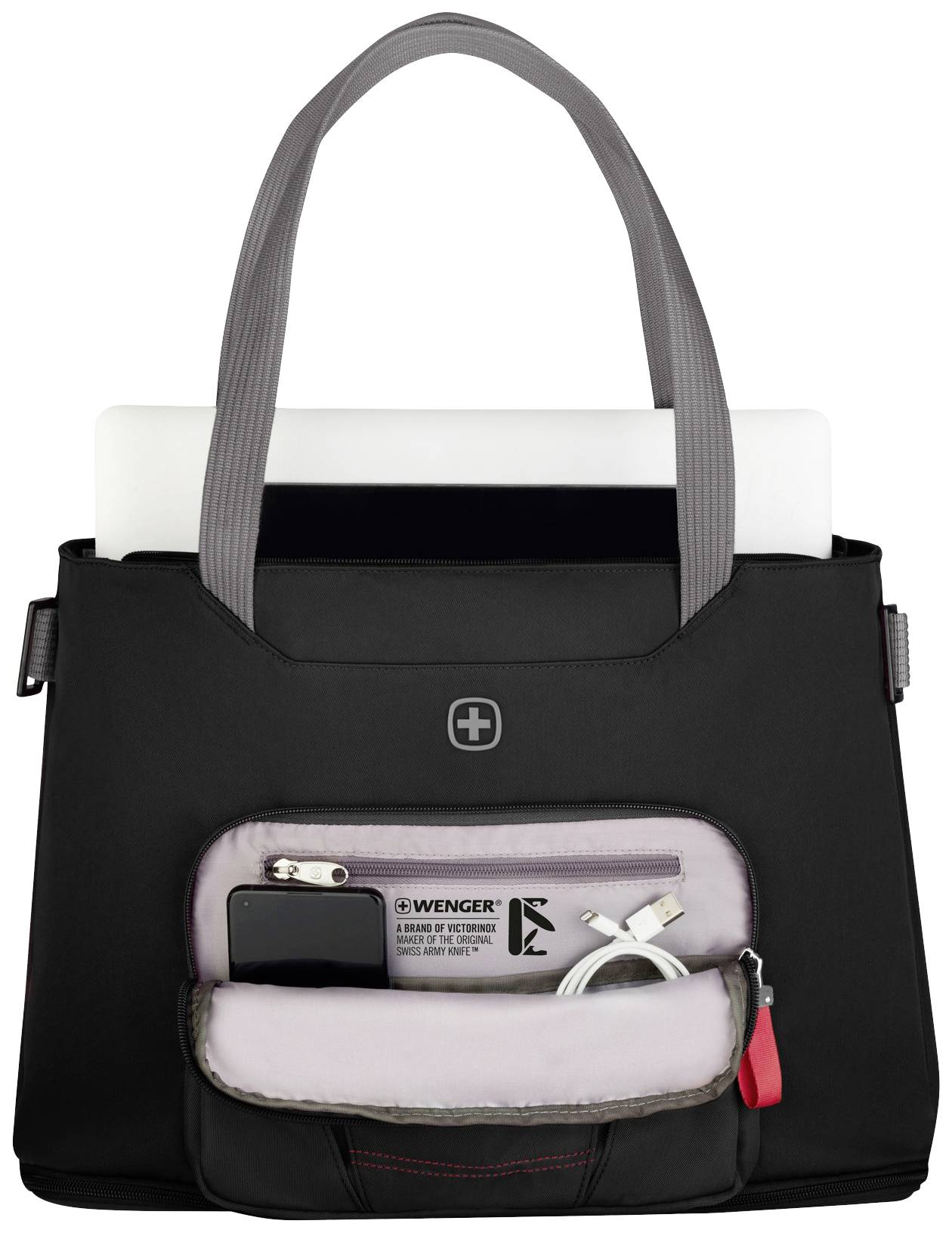 Czarna torba na ramię z otwartą przednią kieszenią. W kieszeni widoczny jest smartfon, kabel ładujący i długopis. Na wierzchu częściowo wystaje laptop.