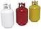 Trzy kolorowe butle gazowe w kolorach białym, czerwonym i żółtym.