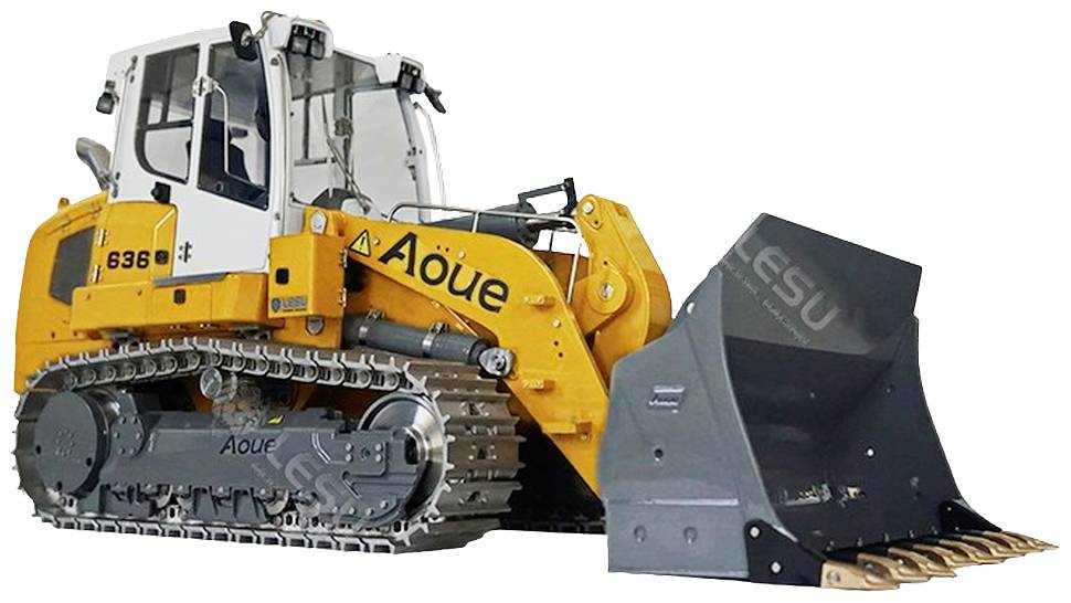 Żółty buldożer z szarą łyżką stoi z boku. Jest solidnie zbudowany i gotowy do prac ziemnych lub projektów budowlanych.