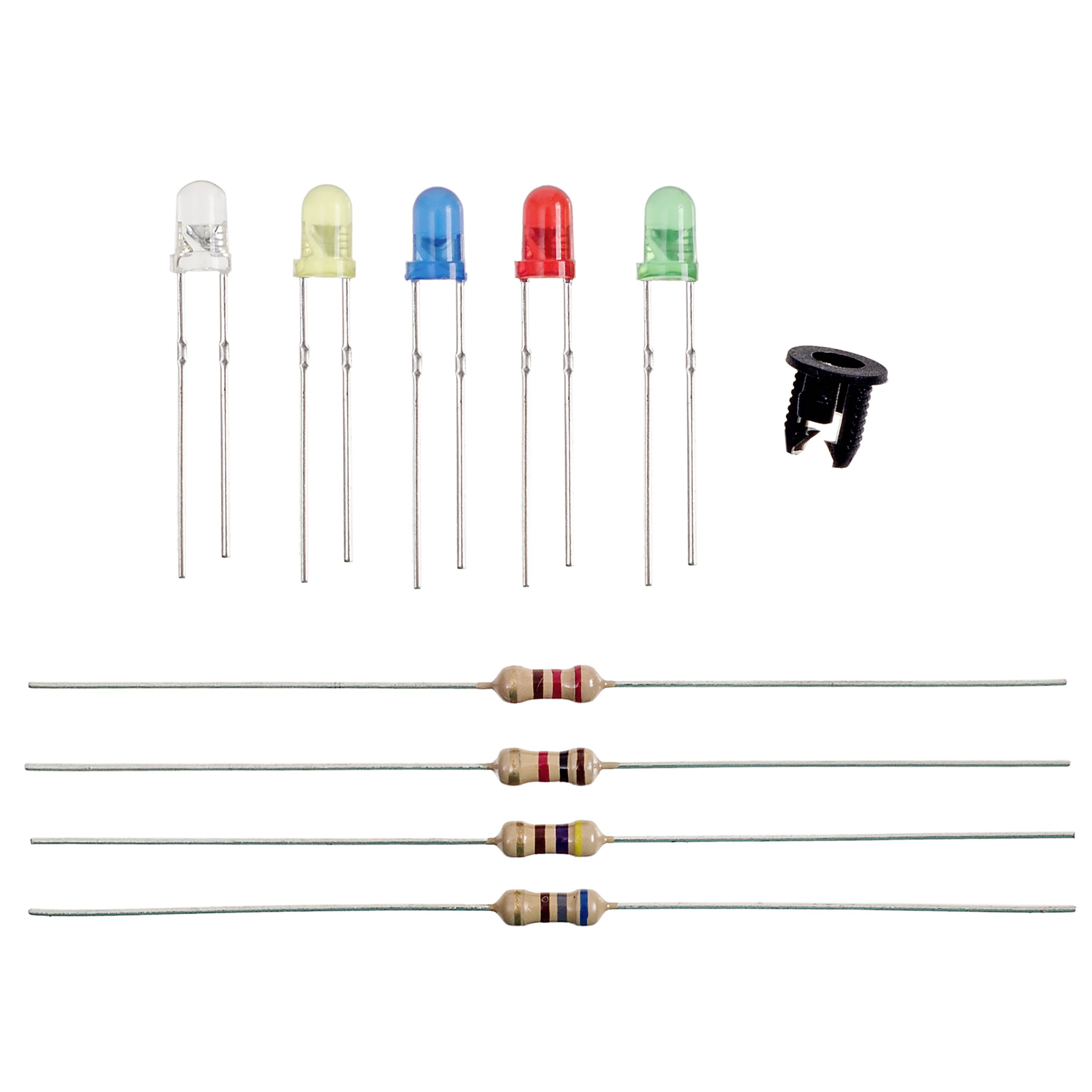 Rząd diod LED w różnych kolorach oraz kilka oporników leżących obok siebie na białej powierzchni.