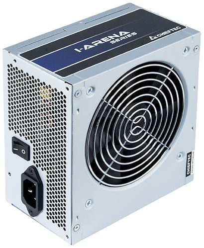 Srebrny zasilacz komputerowy z wentylatorem i złączem zasilania po lewej stronie, model 'Arena Series' firmy Chieftec.