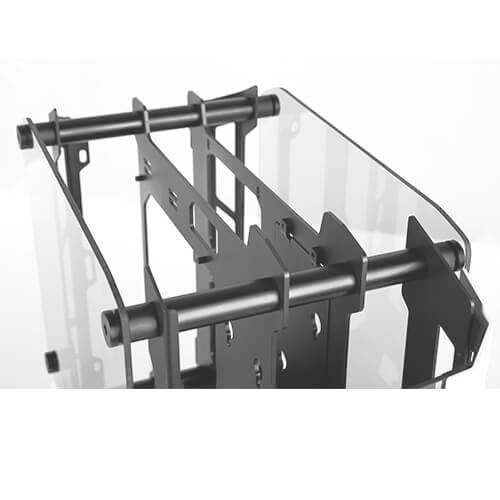 Czarno-białe zdjęcie metalowej konstrukcji ze słupkami i szynami, prawdopodobnie fragment urządzenia przemysłowego lub technicznego.