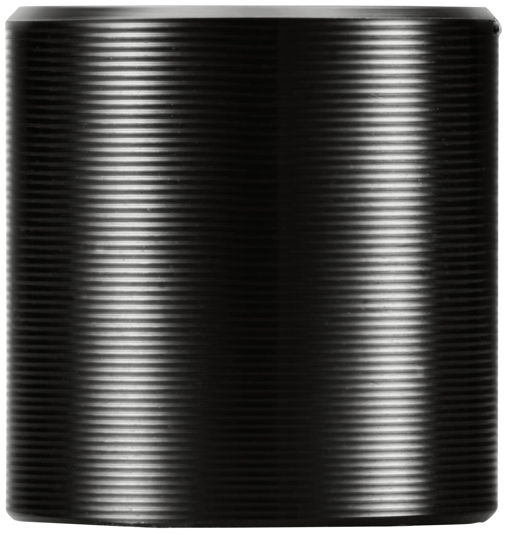 Centralne miejsce zajmuje czarna, cylindryczna metalowa puszka o prążkowanej powierzchni.