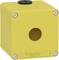 Żółta obudowa z tworzywa sztucznego z okrągłym otworem i wkrętami krzyżakowymi w narożnikach, z napisem 'Schneider Electric' na spodzie.