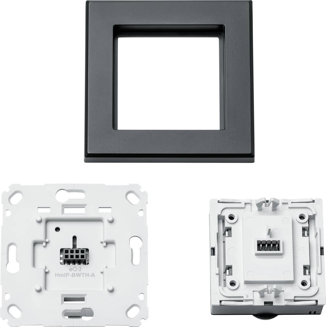 'Pojedyncze elementy zestawu przełączników, w tym ramka i moduł, w kolorach czarnym i białym, do montażu ściennego w pomieszczeniu.'