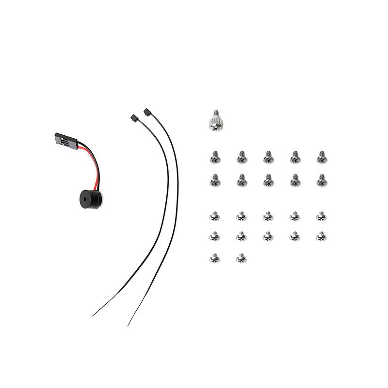 Elektroniczny brzęczyk i kilka małych śrub rozłożonych na białym tle. Wszystkie komponenty zestawu montażowego.