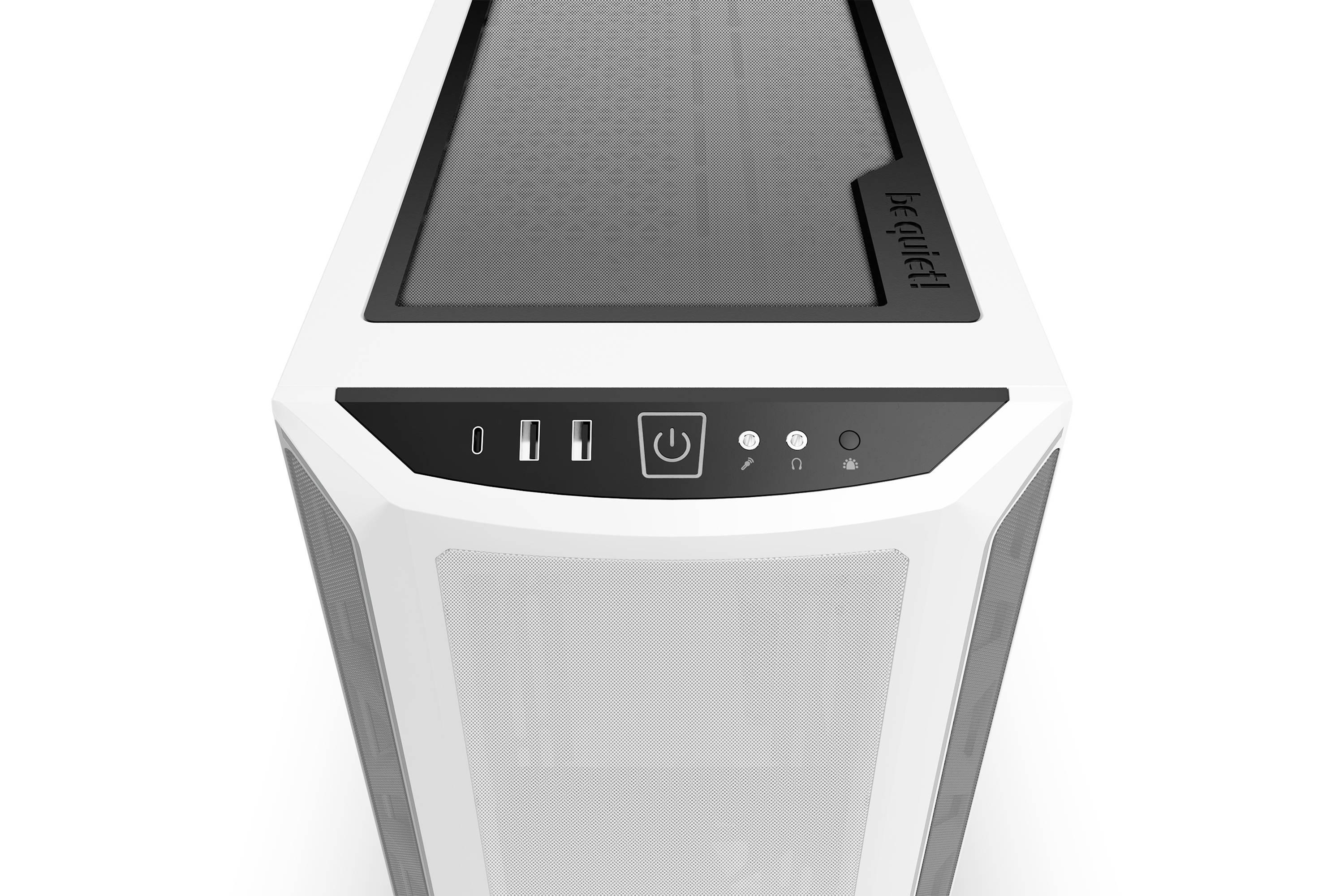 Obudowa komputera jest biała z przezroczystym oknem na górze. Z przodu znajdują się porty USB i włącznik sieciowy.