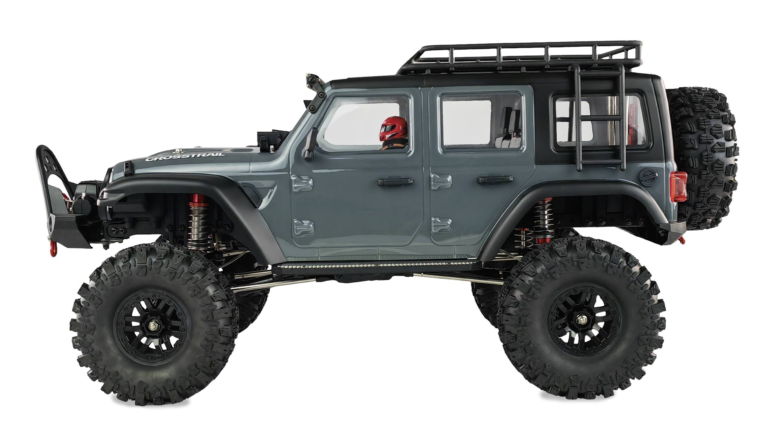 Szary, wytrzymały model samochodu w stylu Jeep z dużymi oponami i klatką bezpieczeństwa. Prezentuje sportowy, przygodowy wygląd.