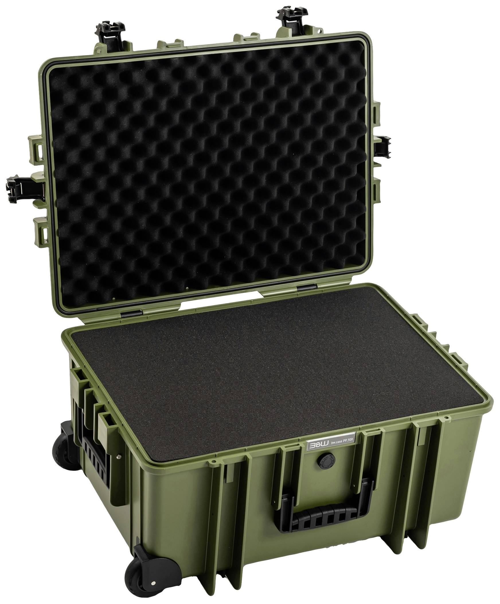 Zielony, otwarty twardy kufer z wyściółką piankową w pokrywie. Kufer stoi na kółkach i posiada uchwyty boczne.