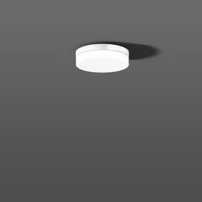 Minimalistyczna lampa sufitowa LED jest zamontowana na szarej suficie i rzuca delikatny cień.
