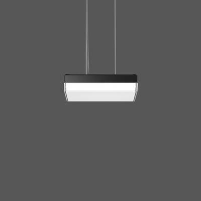 Nowoczesna, wisząca lampa prostokątnego kształtu świeci na tle szarej ściany.
