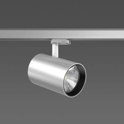Srebrna lampa szynowa o nowoczesnym, minimalistycznym designie wisi na szynie na szarym tle.