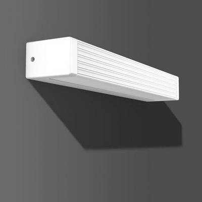 Prostokątny, biały, żebrowany obiekt na szarej ścianie, charakteryzujący się minimalistycznym designem. Rzuca cień.