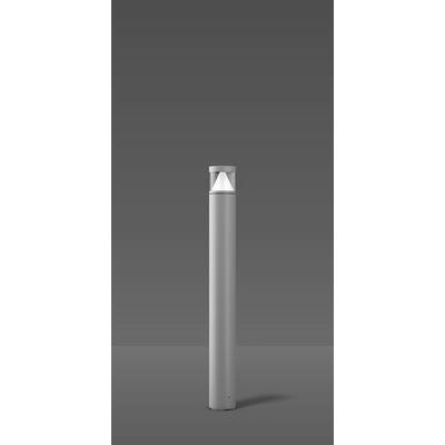 Smukła, cylindryczna lampa zewnętrzna z przejrzystą obudową i detalem w kształcie piramidy na czubku, umieszczona na tle przechodzącym w odcieniach szarości.