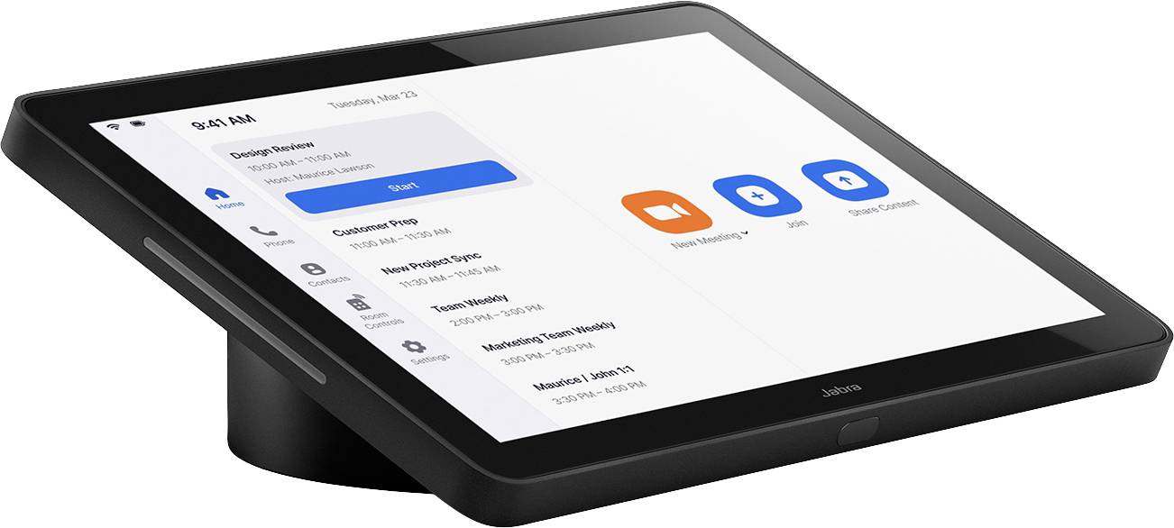 Ekran w sali konferencyjnej wyświetla spotkanie o godzinie 9:00 z opcjami "Nowe spotkanie" i "Dołącz".