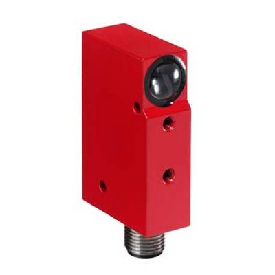Czerwony elektroniczny czujnik z okrągłą, czarną soczewką na prostokątnej obudowie oraz metalowym złączem od spodu.