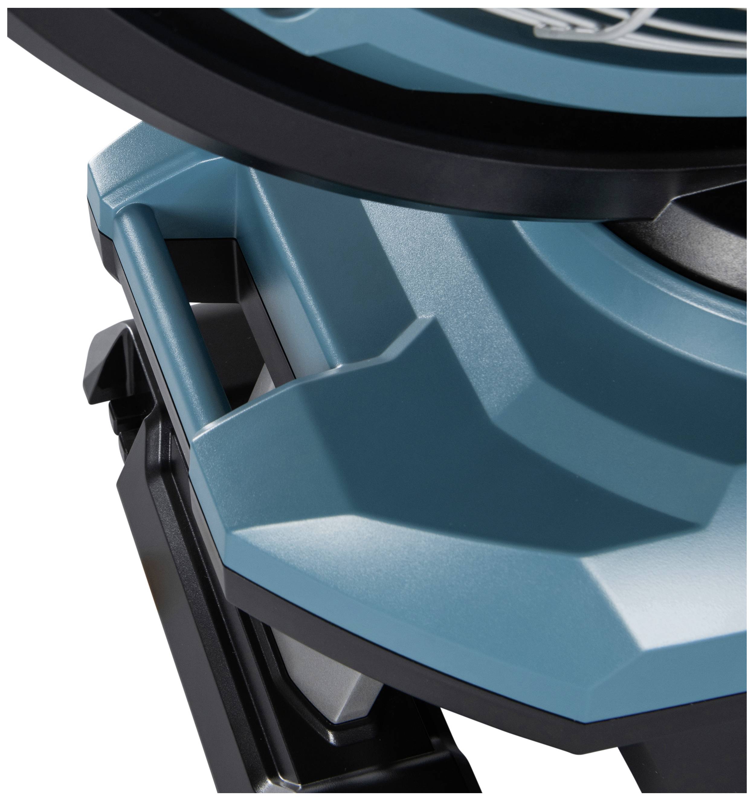 Zbliżenie niebieskiej, geometrycznej części plastikowej z czarną krawędzią. Struktura przypomina element techniczny.