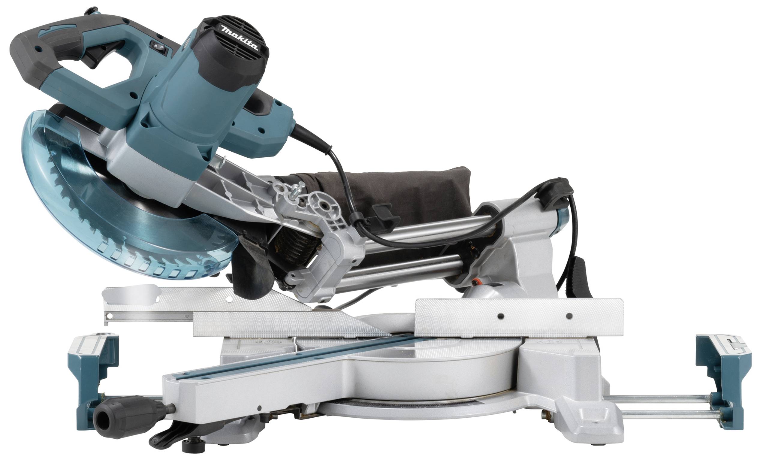 Pilarka tarczowa do prac stolarskich, w kolorze zielonym i czarnym, umieszczona na stole warsztatowym.