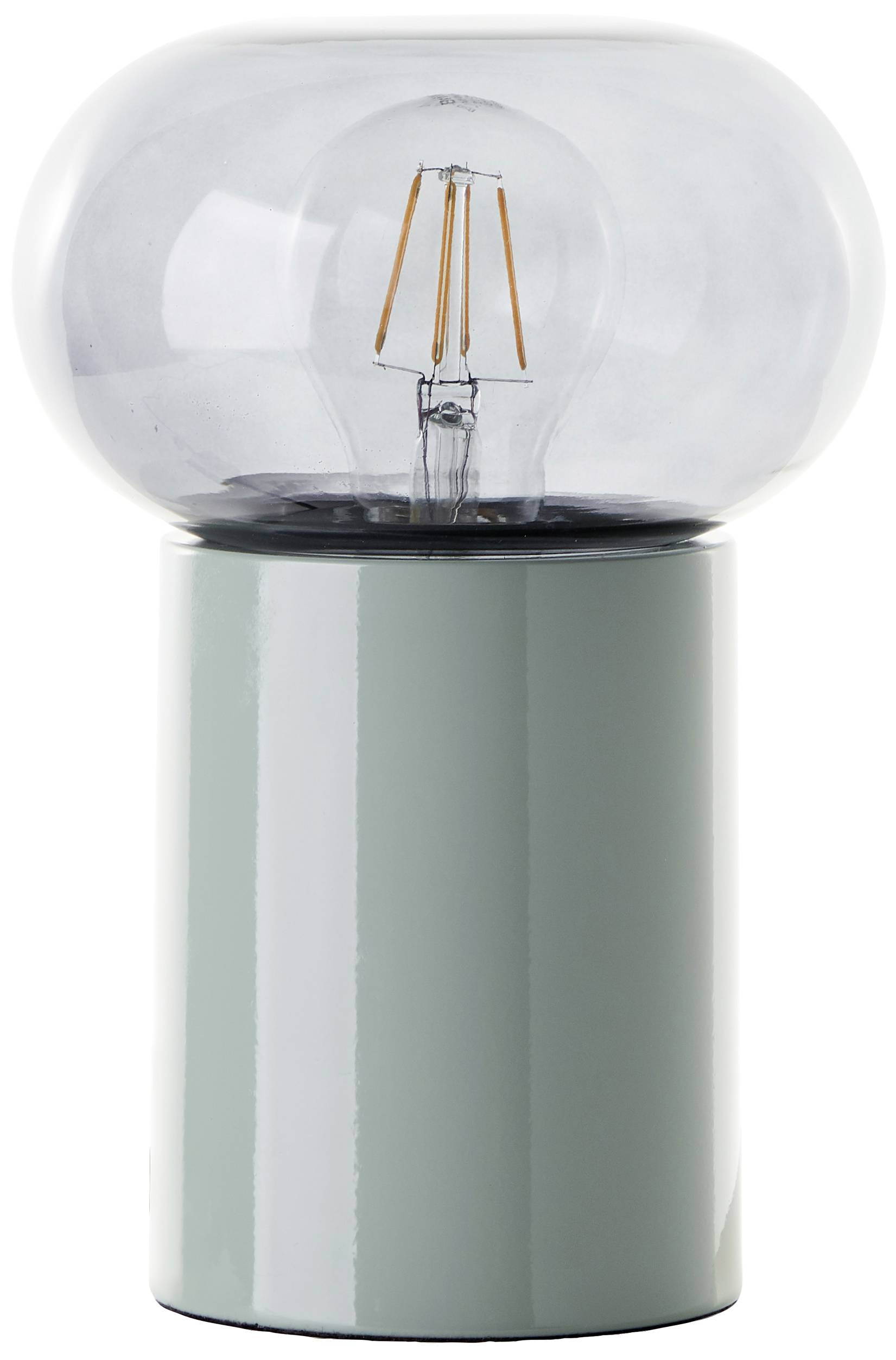 Nowoczesna lampa stołowa z przezroczystym szklanym kloszem i widoczną żarówką, stojąca na cylindrycznym, błyszczącym podstawku.