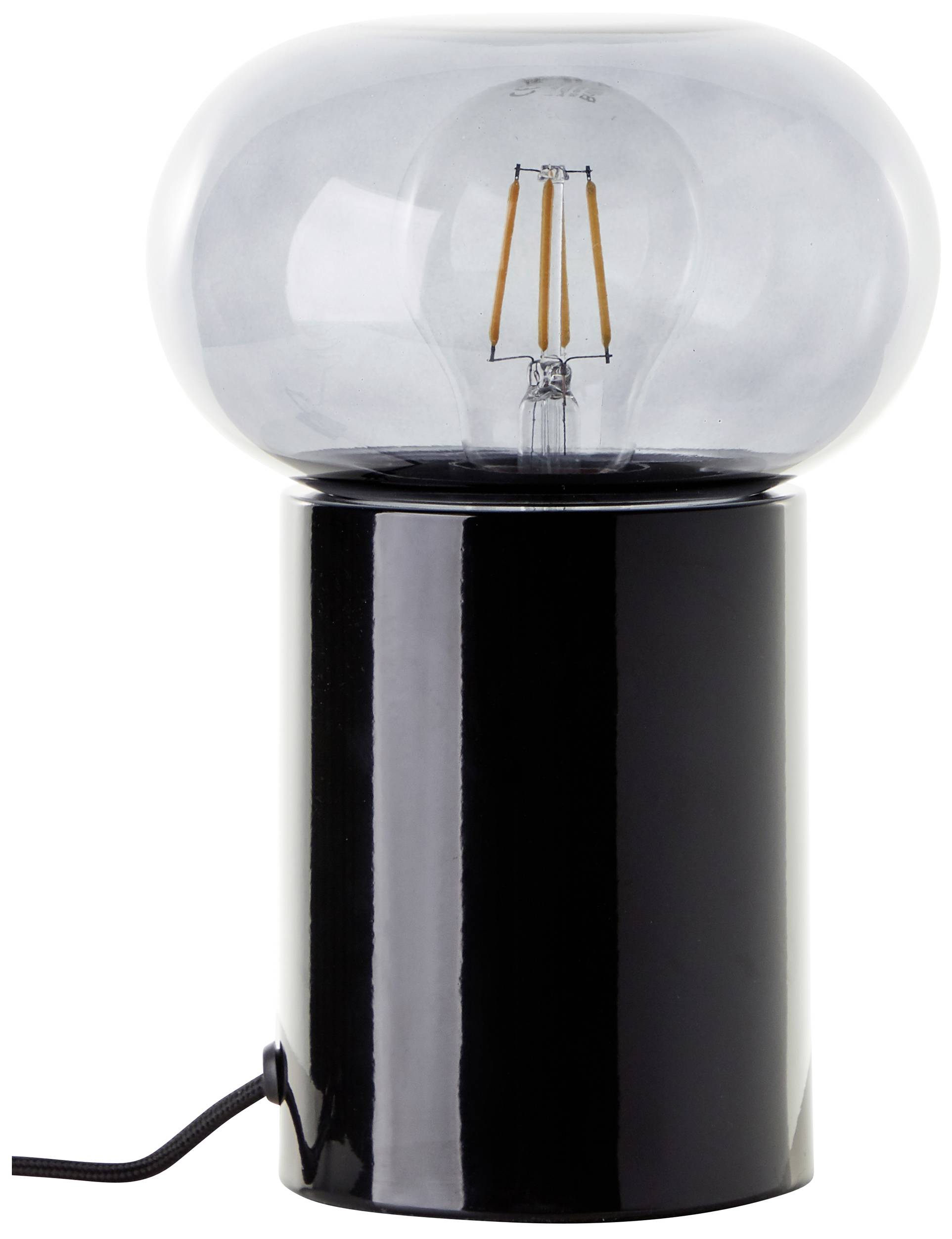 Nowoczesna lampa stołowa z czarną cylindryczną podstawą i dużą, przezroczystą żarówką.